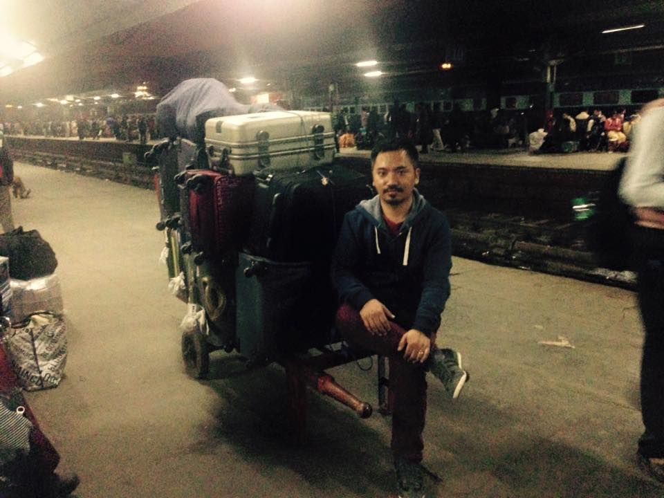 Thupten at a railway station in India